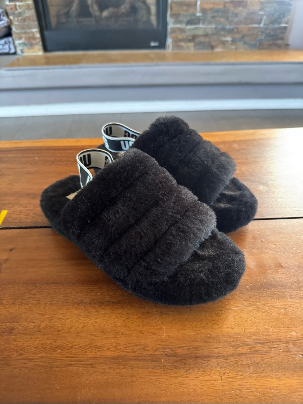 UGG Kids Black Faux Fur Slide with Branded Heel Strap